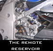 The remote reservoir fits onto a carrier where the rotary damper bolts. We supply the carrier.